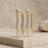 The Celestial Cascade Triple-Loop Diamond Earrings